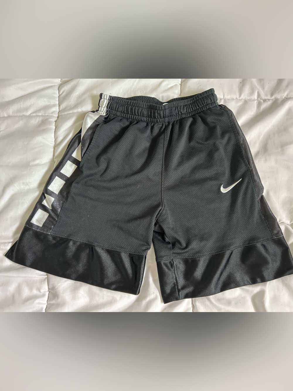 Nike Black Shorts with White Swoosh and Side Stripe